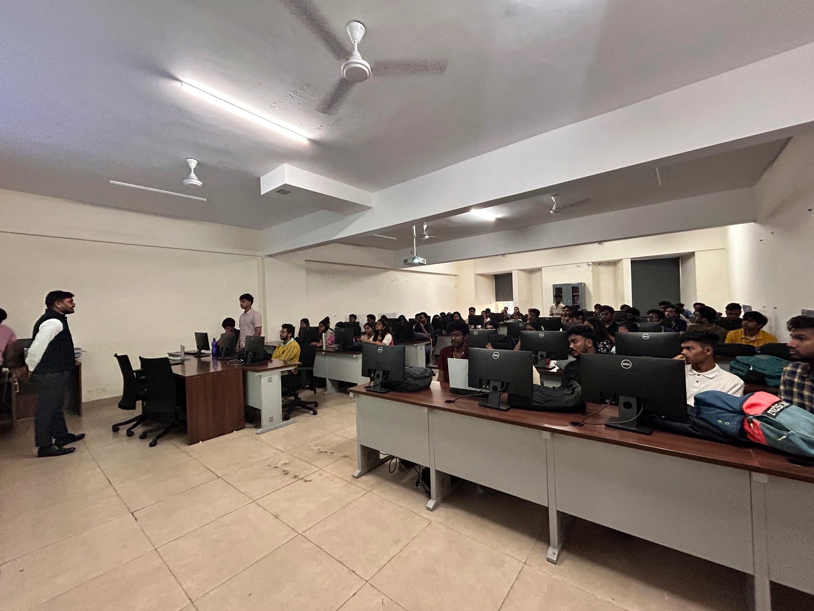 Hands-on classroom session with students in the AI & ML lab.